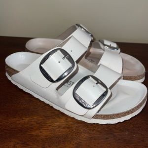 White women’s Birkenstock sandals